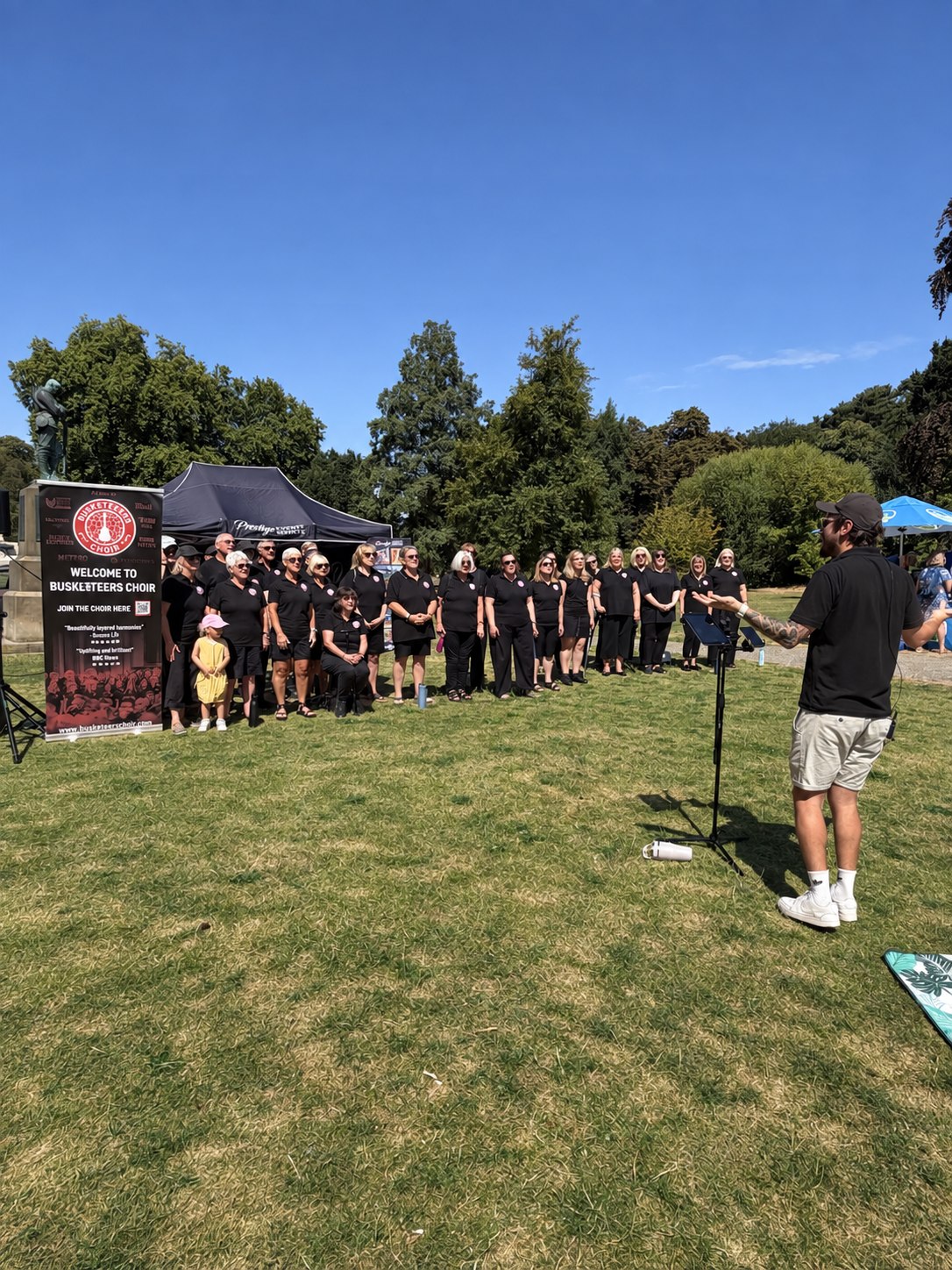 The Buskerteers Choir performing at Christchurch Park Market