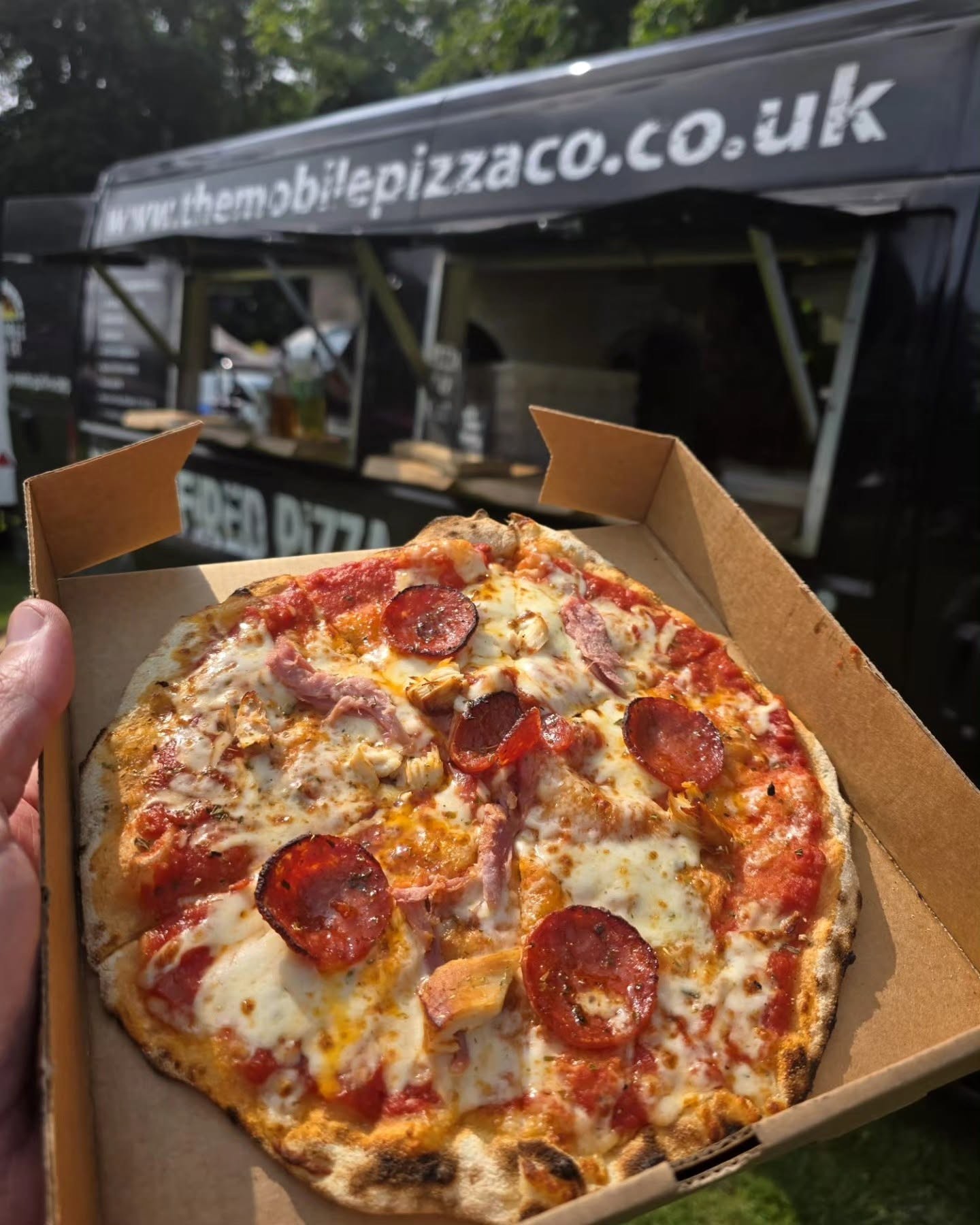 Fresh pizza from a street food stall at Christchurch Park Market