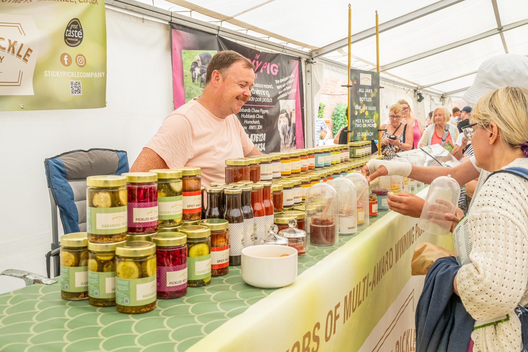 Visitors sampling artisan preserves at the Craft Show