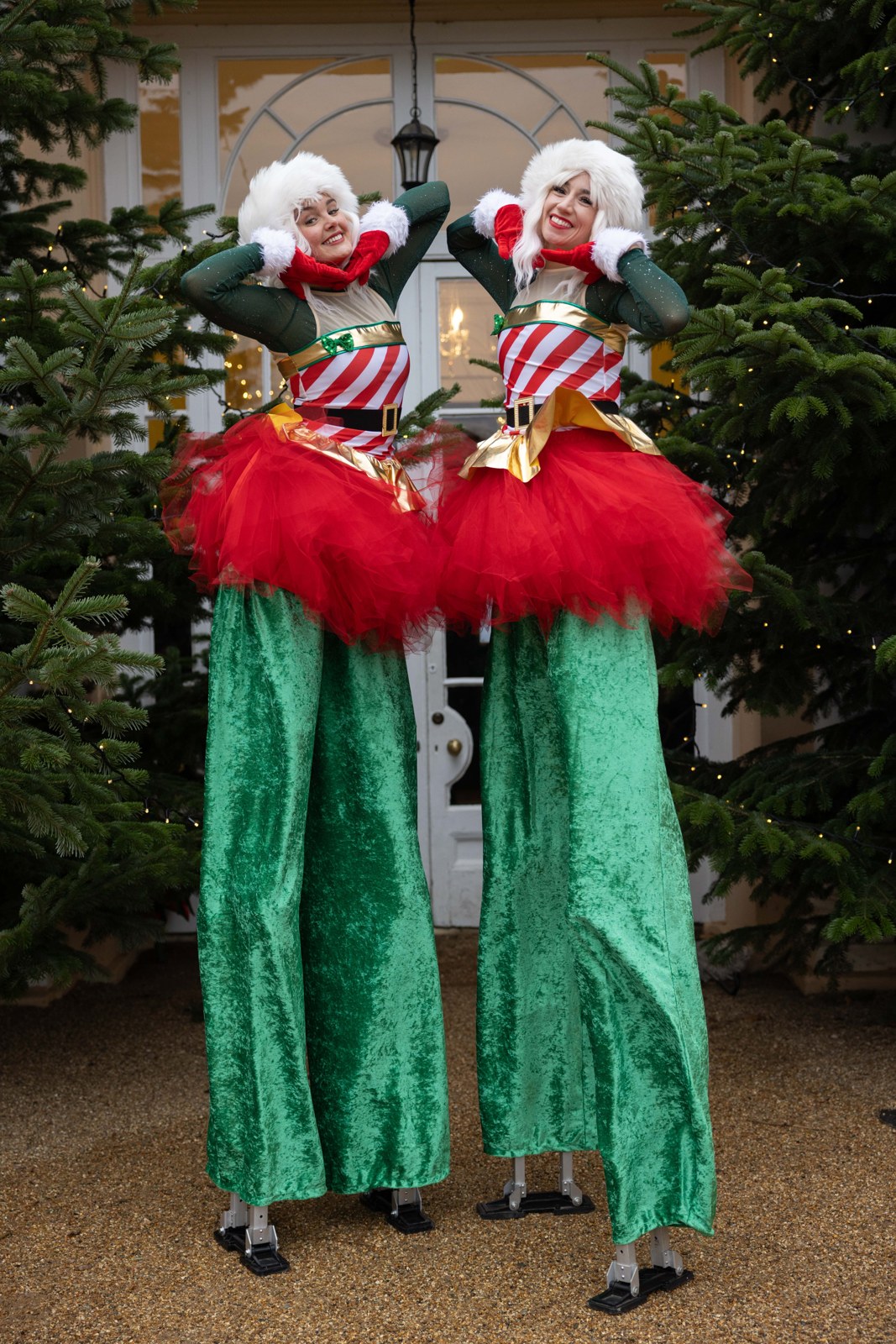 Festive stilt walkers