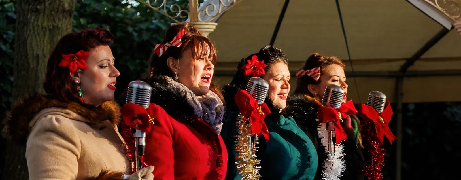 Christmas singers performing live at a Prestige County Events fair